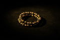 Midnight Faith Black & Gold Cross Bracelet Background